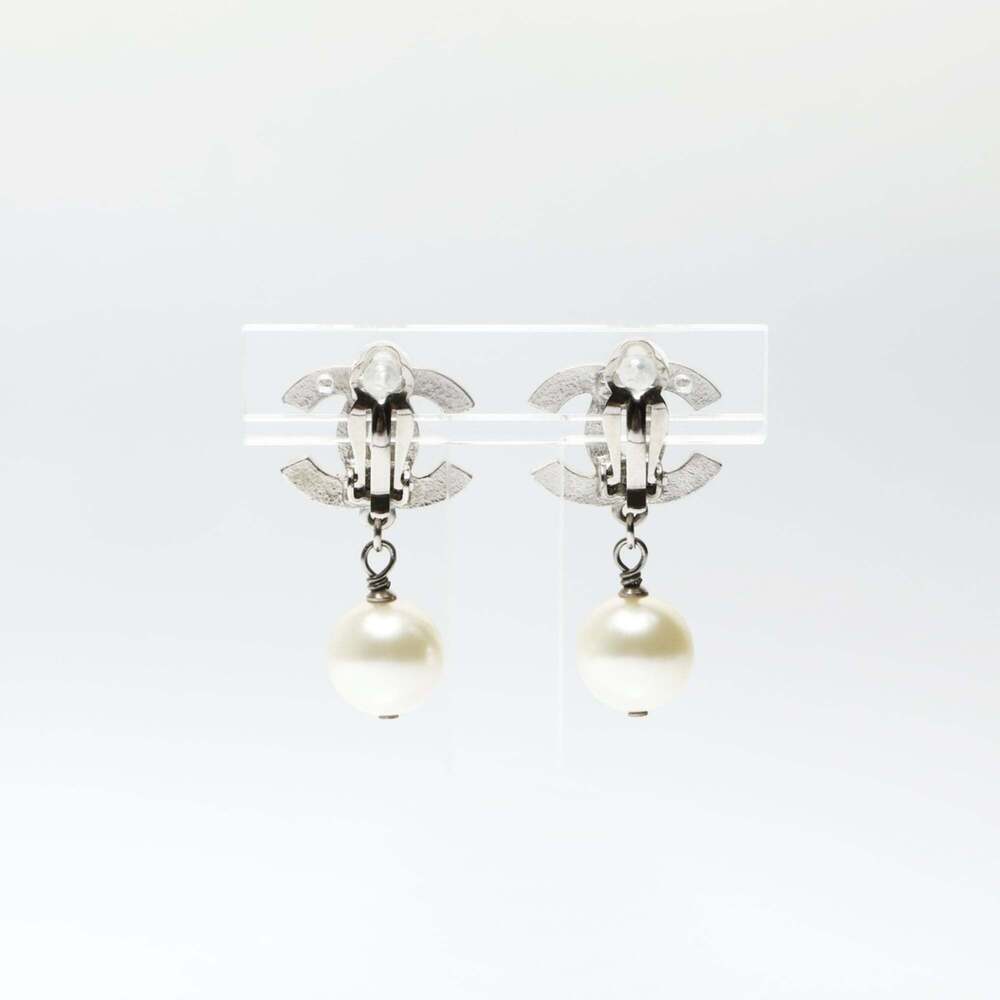 CHANEL Silver Pearl Logo Earrings - Picture 2 of 7